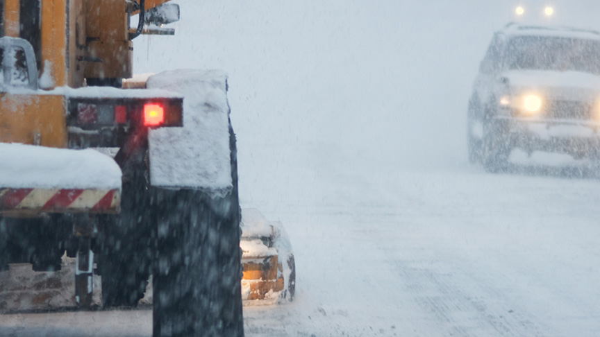 Vehicle moving snow