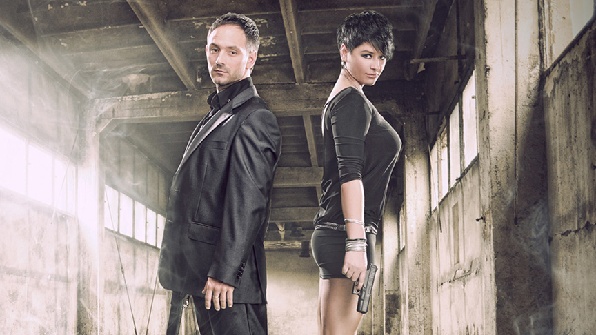 Woman and man back to back